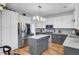 Updated kitchen features stainless steel appliances, granite countertops, and a center island at 123 Dasharon Ln, Goose Creek, SC 29445