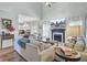 Living room with a fireplace, vaulted ceilings and an open concept to the kitchen at 123 Dasharon Ln, Goose Creek, SC 29445