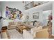 Comfortable living room with neutral tones, ample seating, and unique wall art at 123 Dasharon Ln, Goose Creek, SC 29445