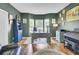 Inviting office space with hardwood floors, built-in shelving, and natural light at 123 Dasharon Ln, Goose Creek, SC 29445
