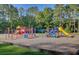 Colorful community playground featuring slides, climbing structures, and swings at 123 Dasharon Ln, Goose Creek, SC 29445