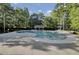 Community swimming pool with surrounding lounge chairs, a picnic area, and clear blue water at 123 Dasharon Ln, Goose Creek, SC 29445