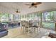 Relaxing screened porch with a dining area and views of the private backyard at 123 Dasharon Ln, Goose Creek, SC 29445