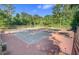 Outdoor community tennis courts with nets, fencing, and nearby trees at 123 Dasharon Ln, Goose Creek, SC 29445