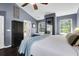 Bedroom featuring a light blue painted walls, a large bed, and natural light from the windows at 1255 Horseshoe Bnd, Mount Pleasant, SC 29464