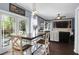 Charming dining area with French doors, a wooden table, and views of the living area at 1255 Horseshoe Bnd, Mount Pleasant, SC 29464