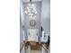 Expansive two-story foyer with a decorative light fixture and a view of the front door at 1255 Horseshoe Bnd, Mount Pleasant, SC 29464
