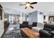 Open-concept living area with dark wood floors, seating, and entryway view at 1255 Horseshoe Bnd, Mount Pleasant, SC 29464