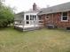 Spacious wooden backyard deck perfect for outdoor entertaining with views of the surrounding landscape at 136 Tall Pines Rd, Ladson, SC 29456