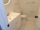 Bathroom with a tiled floor, white cabinets, and a white toilet with silver fixtures at 136 Tall Pines Rd, Ladson, SC 29456