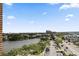 Expansive aerial view showcases the cityscape, waterfront, and a clear blue sky at 14 Lockwood Dr # 6E, Charleston, SC 29401
