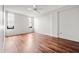 Inviting bedroom featuring wood floors, ceiling fan, and bright windows at 14 Lockwood Dr # 6E, Charleston, SC 29401