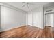 Bright bedroom features wood floors, ceiling fan, and double closets for ample storage at 14 Lockwood Dr # 6E, Charleston, SC 29401