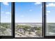 Beautiful harbor view from the window featuring blue skies, trees, and boats at 14 Lockwood Dr # 6E, Charleston, SC 29401