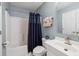 Bright bathroom with tub-shower combination and modern vanity at 1411 River Front Dr, Charleston, SC 29407