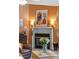 Cozy fireplace with decorative mantel and stylish accents at 1411 River Front Dr, Charleston, SC 29407