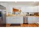 Bright and airy kitchen with stainless steel appliances and a convenient breakfast bar at 1411 River Front Dr, Charleston, SC 29407