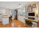 Bright kitchen featuring an eat-in bar and an adjacent home office space with lots of natural light at 1411 River Front Dr, Charleston, SC 29407