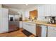 Well-lit kitchen with stainless steel appliances, white cabinets, and an open design at 1411 River Front Dr, Charleston, SC 29407