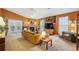 Bright living room with fireplace, modern furniture, and french doors at 1411 River Front Dr, Charleston, SC 29407