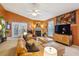 Spacious living room featuring a fireplace, stylish seating, and ample natural light at 1411 River Front Dr, Charleston, SC 29407