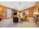 Spacious living room with fireplace and built-in bookshelf at 1411 River Front Dr, Charleston, SC 29407