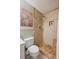 Shower with tile surround, built-in niche, and handheld shower head at 1411 River Front Dr, Charleston, SC 29407