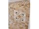 Close up detail of travertine tile shower inset at 1411 River Front Dr, Charleston, SC 29407