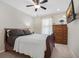 Cozy bedroom with a ceiling fan, mounted TV, and natural light from the window at 143 Basket Grass Ln, Summerville, SC 29486