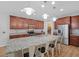 Spacious kitchen featuring a large island with seating, granite countertops, and stainless steel appliances at 143 Basket Grass Ln, Summerville, SC 29486