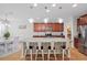 Open concept kitchen with an island, stainless steel appliances, and a dining area nearby at 143 Basket Grass Ln, Summerville, SC 29486