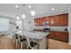 Well-lit kitchen featuring a large island with seating, stainless steel appliances, and stylish finishes at 143 Basket Grass Ln, Summerville, SC 29486