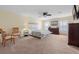 Spacious main bedroom with ceiling fan, neutral paint, carpet flooring, and ample natural light at 143 Basket Grass Ln, Summerville, SC 29486