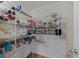 Well-organized pantry with metal shelving offers ample storage space for groceries and household items at 143 Basket Grass Ln, Summerville, SC 29486