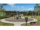 A playground featuring slides, benches, and a Little Free Library at 143 Basket Grass Ln, Summerville, SC 29486