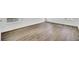 A spacious bedroom with new wood floors, white walls and abundant natural light at 150 Sugar Magnolia Way, Charleston, SC 29414
