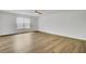 Spacious bedroom features a window, ceiling fan, and wood-look floors at 150 Sugar Magnolia Way, Charleston, SC 29414