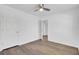 Bedroom with wood floors, white trim, and white door at 150 Sugar Magnolia Way, Charleston, SC 29414
