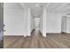 Bright entryway with hardwood floors and arched doorways, creating an open and inviting transition into the home's living spaces at 150 Sugar Magnolia Way, Charleston, SC 29414