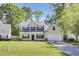 Beautiful two-story home featuring a classic design, well-kept lawn, and an attached garage, perfect for suburban living at 150 Sugar Magnolia Way, Charleston, SC 29414
