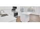 Bright kitchen with stainless steel appliances and white island at 150 Sugar Magnolia Way, Charleston, SC 29414