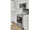 Modern kitchen featuring stainless steel oven and white countertops and cabinets at 150 Sugar Magnolia Way, Charleston, SC 29414