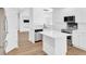 Modern kitchen with white cabinetry, stainless steel appliances, and center island at 150 Sugar Magnolia Way, Charleston, SC 29414