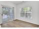 Bright living space with wood floors, natural light and glass doors to a patio at 150 Sugar Magnolia Way, Charleston, SC 29414