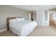 Bedroom with carpet, king bed, and built in white wardrobe at 1651 Atlantic Ave, Sullivans Island, SC 29482