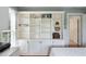 Bedroom with floor to ceiling bookcase and storage at 1651 Atlantic Ave, Sullivans Island, SC 29482