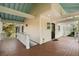 Wrap around deck showing the house with access to the large yard below at 1651 Atlantic Ave, Sullivans Island, SC 29482