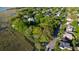 Scenic aerial view of the neighborhood with marsh views, showing surrounding trees and lush landscaping at 17 8Th Ave # 17G, Charleston, SC 29403