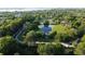 Scenic aerial view of Hampton Park, featuring lush greenery and a beautiful lagoon with a fountain at 17 8Th Ave # 17G, Charleston, SC 29403