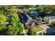 An aerial view of a multi-Gathering brick home with a dark roof and lush green surroundings at 17 8Th Ave # 17G, Charleston, SC 29403